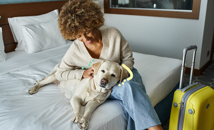 chien et femme au lit